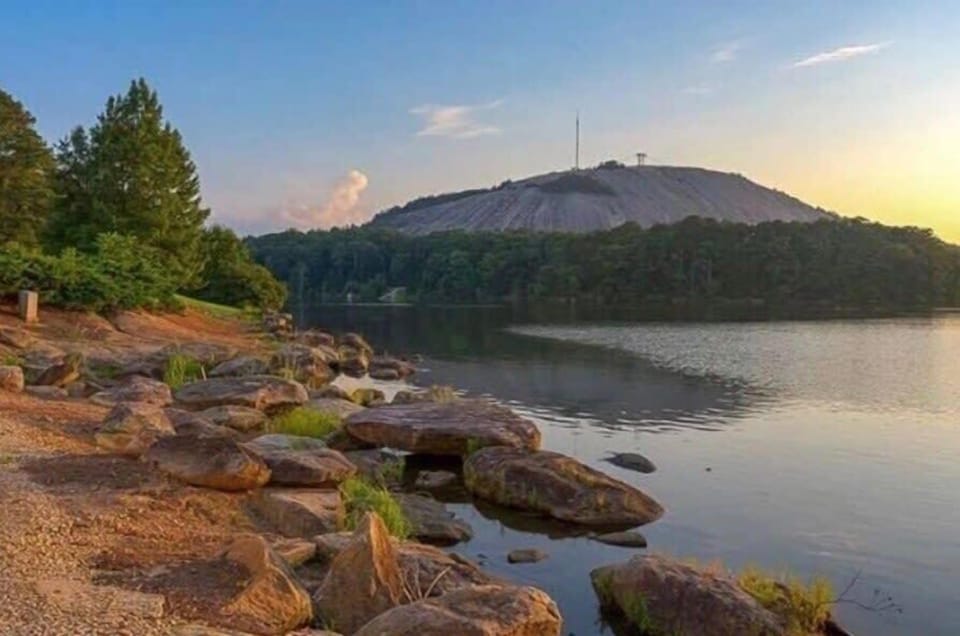 Watch the light change over Stone Mountain at golden hour — a world-class natural wonder that never gets old, accessible any day of your stay.