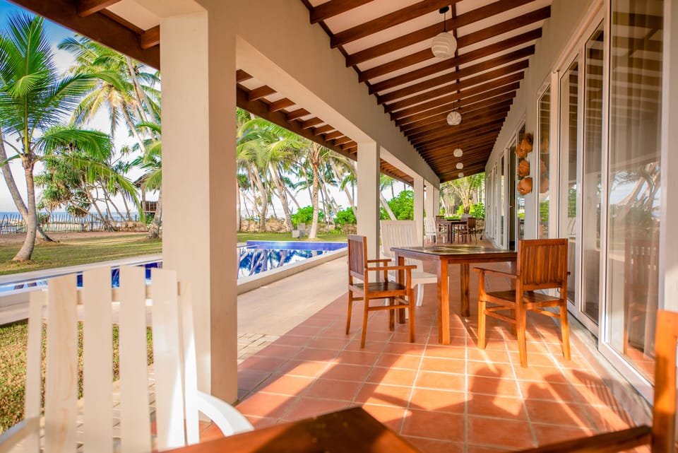 patio overlooking pool and ocean