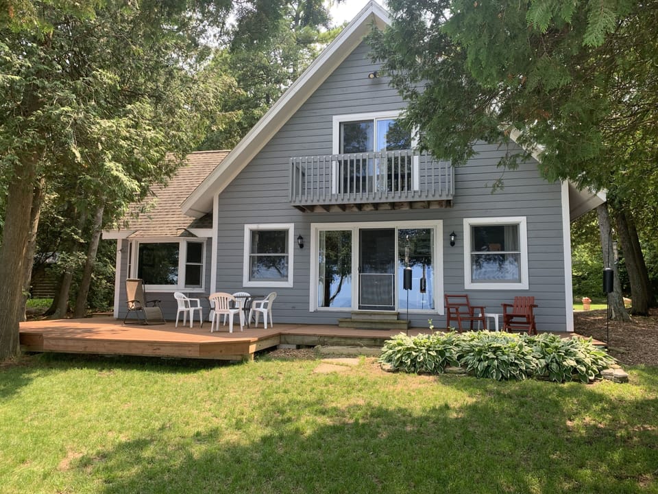 Lakeside front of house from water's edge