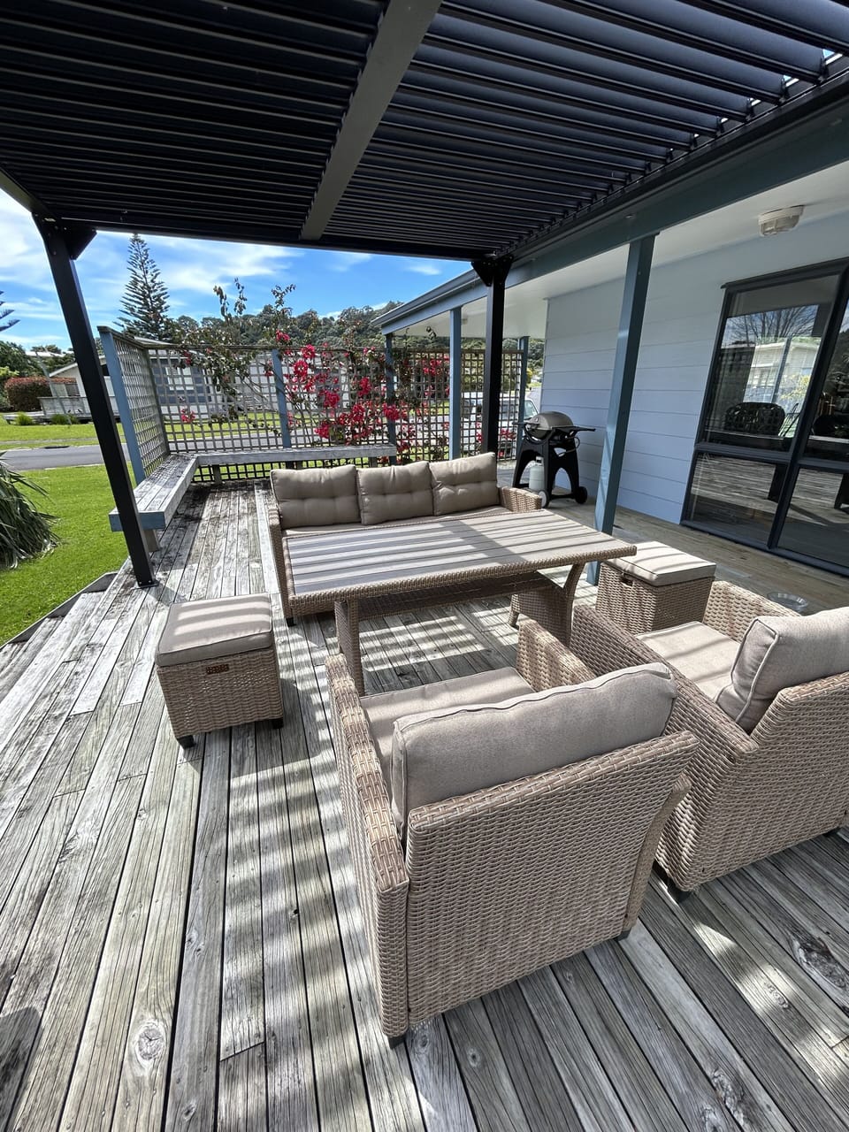 Outside living with louvres, outdoor furniture and bbq