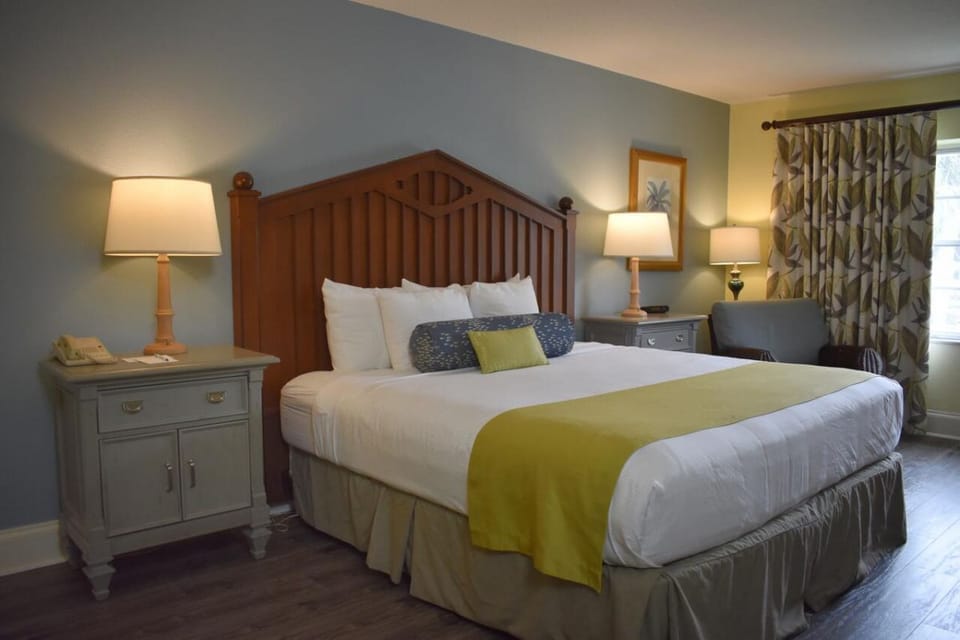 Drift off in plush bedding with soothing, soft evening light.