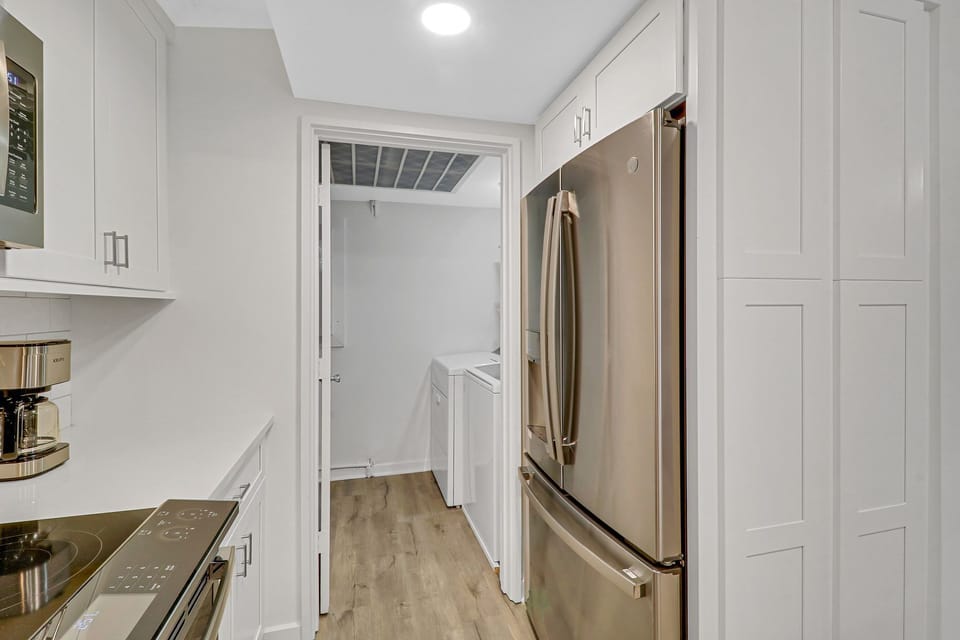 Laundry Room - Laundry room is located off the back of the kitchen.