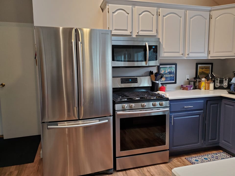 Upstairs full kitchen with gas stove