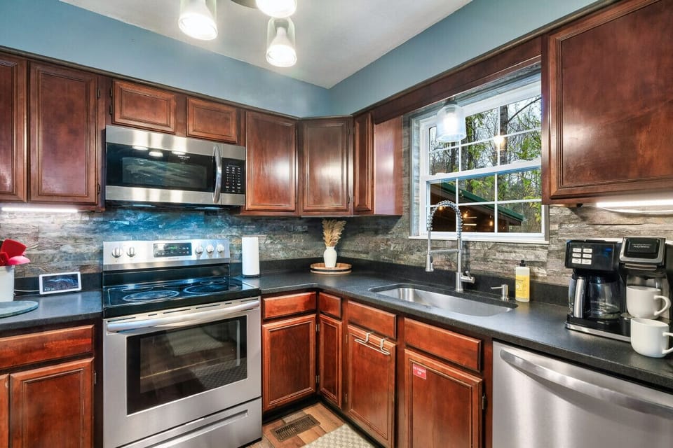 Beautiful kitchen with multiple appliances and accessories