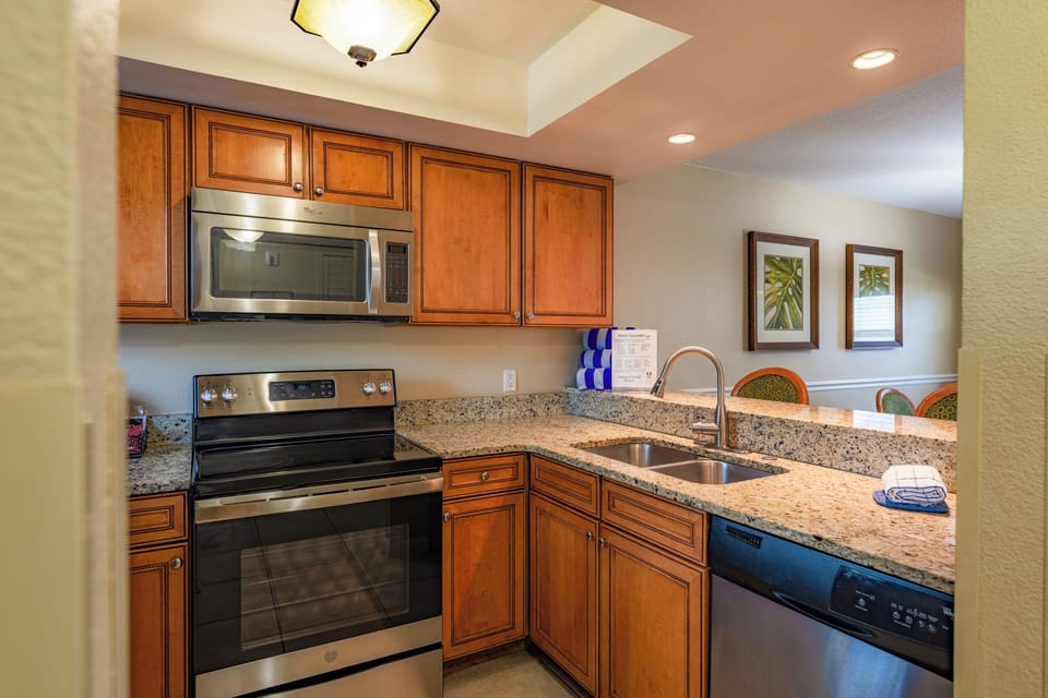 Cook with ease in the fully equipped, granite-top kitchen.