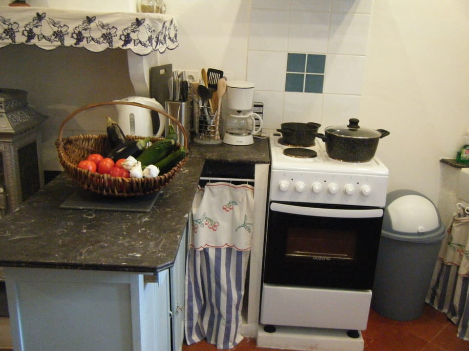 Well equipped kitchen with full size oven, microwave and fridge/freezer
