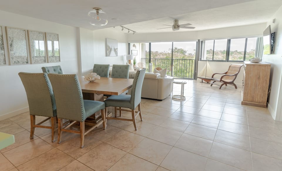 Dining room area, living room and balcony