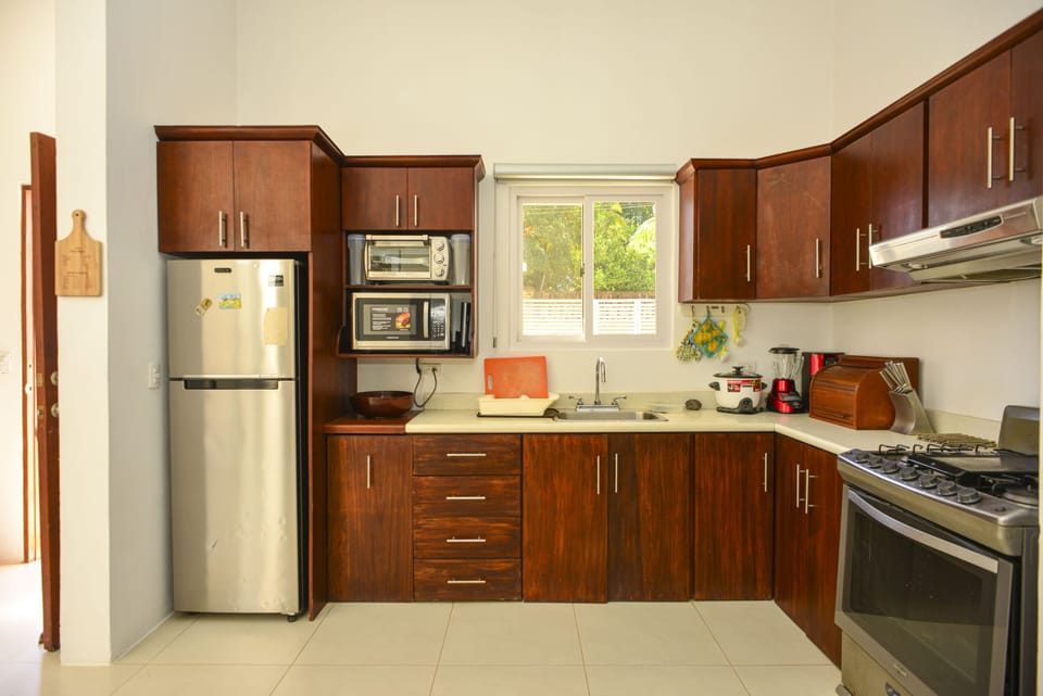 Kitchen Includes:

Oven
Microwave
Cooking Knives
Cooking Utensils
Blender
Fridge