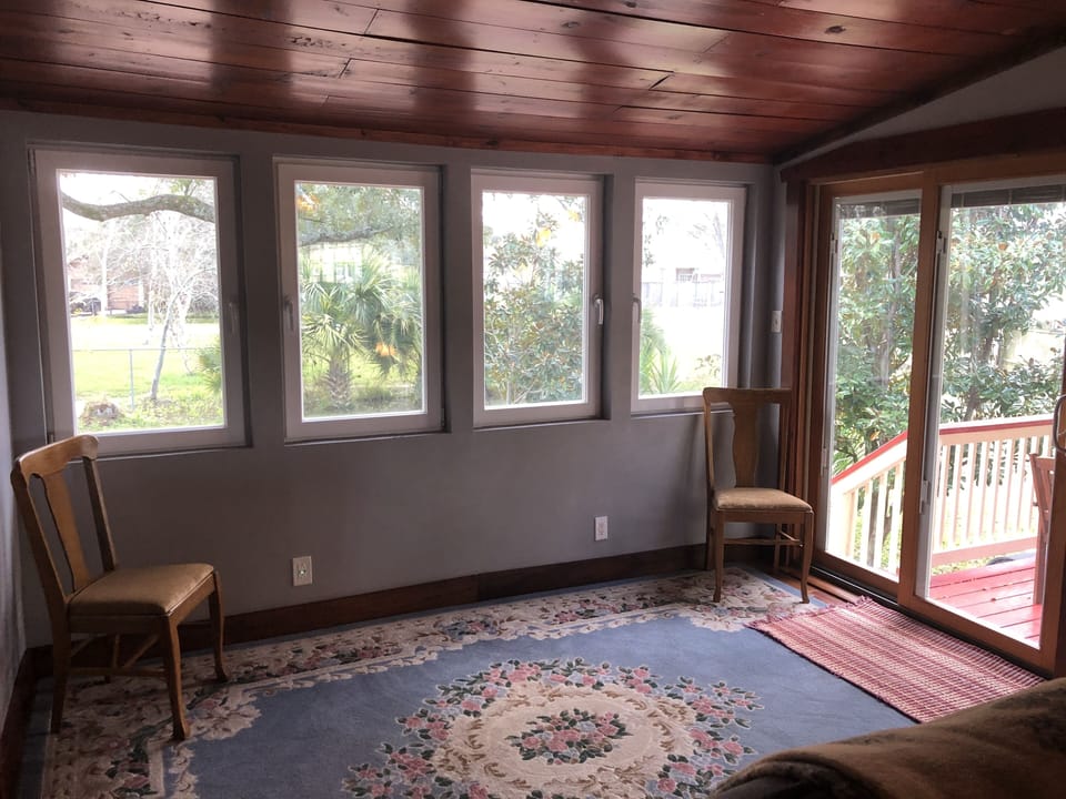 Area off living room with view of back yard