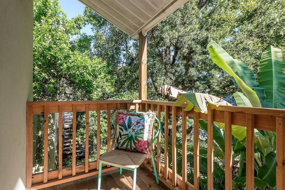 Balcony Oasis: Enjoy refreshing views and tropical vibes from your private outdoor retreat!