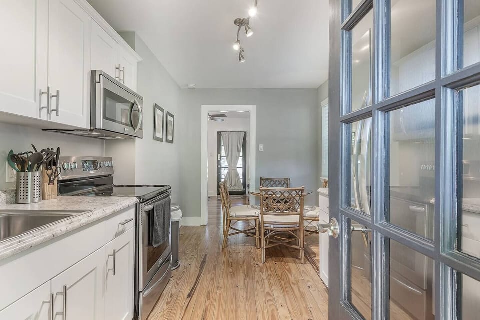 Charming Kitchen: Bright space with modern appliances and a delightful dining area for memorable meals!
