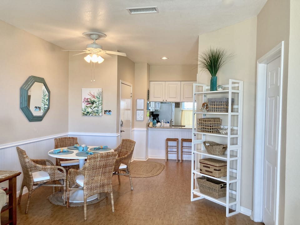 Totally Tommy Bahama casual dining for 4 (expands to 6) + 2 at the breakfast bar