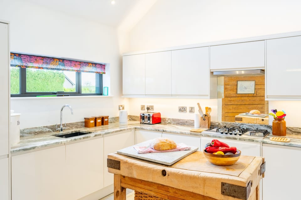 Prepare a home cooked meal in the well-equipped kitchen