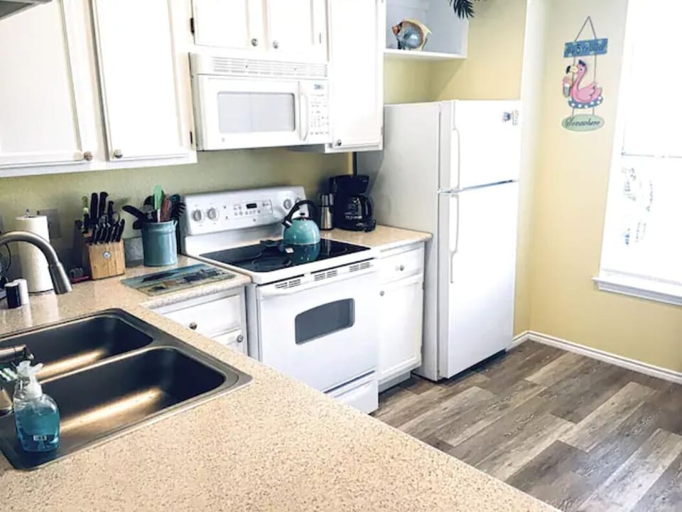 Chef's delight of a kitchen ~ equipped-to-the-hilt plus view of the pool!