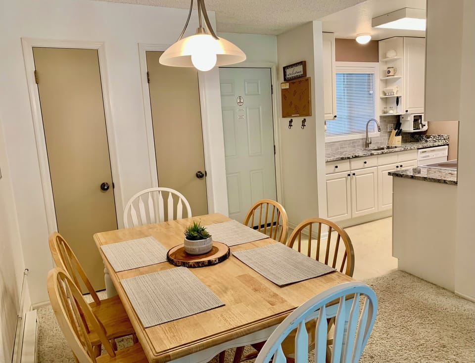 Ample dining space, open to kitchen and living room spaces, coat closet