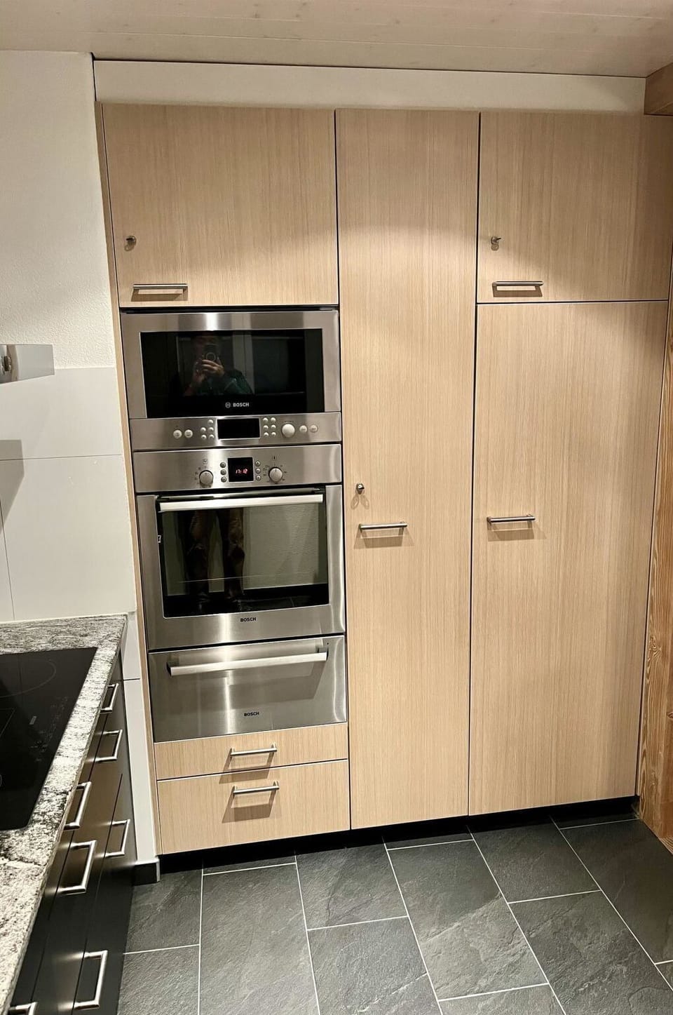 Flooring, Wood, Kitchen Appliance, Floor, Kitchen, Interior Design, Cabinetry, Major Appliance, Home Appliance, Cupboard