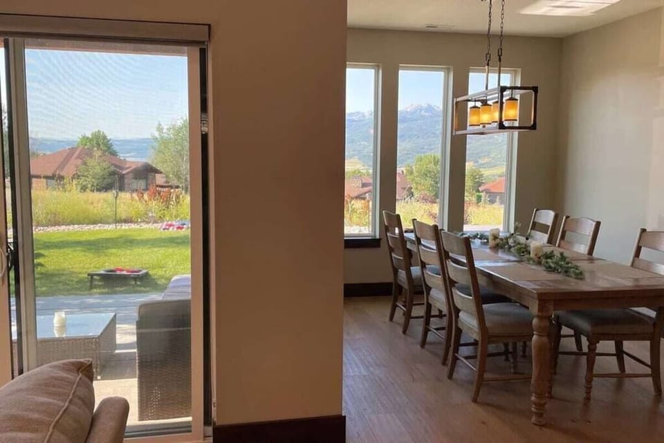 Separate dining area, tucked off the kitchen, a few short steps to the patio, with stunning views of the mountains and back yard.