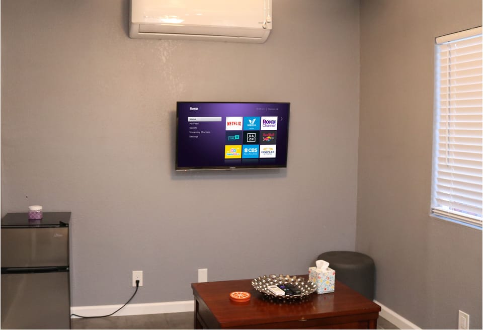 Sit back and enjoy Roku TV - Netflix, Hulu, Youtube, Amazon, etc.