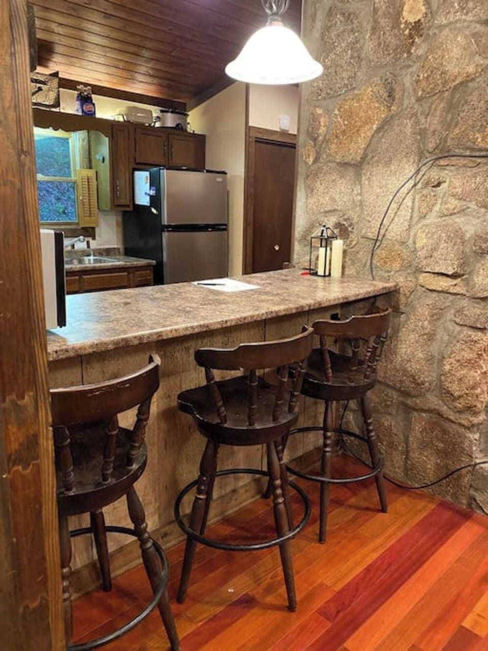 View from the bar into the kitchen.