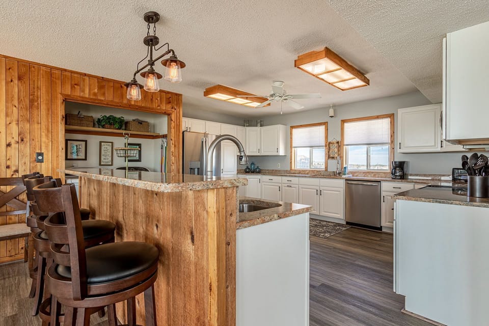 Huge kitchen w/additional island sink allows room to practice being a sous chef