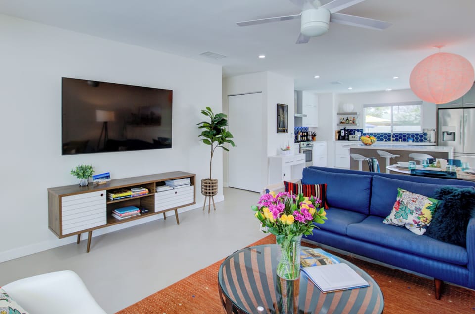 Large indoor smart TV on an articulating mount.