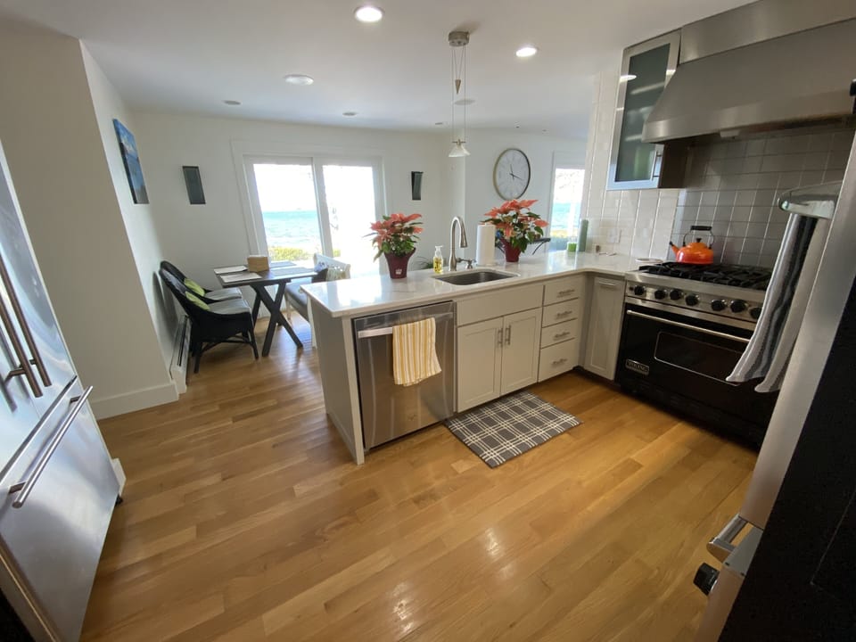 Modern kitchen with a view with Viking and stainless steel appliances