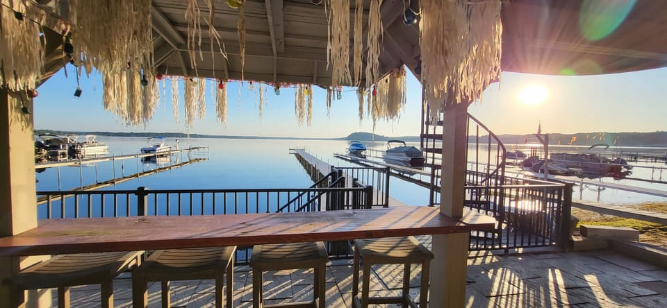 Lakefront living at it's best - Key West Tiki Bar Vibe with connecting dock