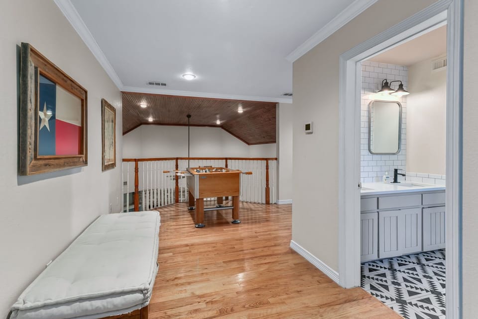 Upstairs landing space with foose ball!