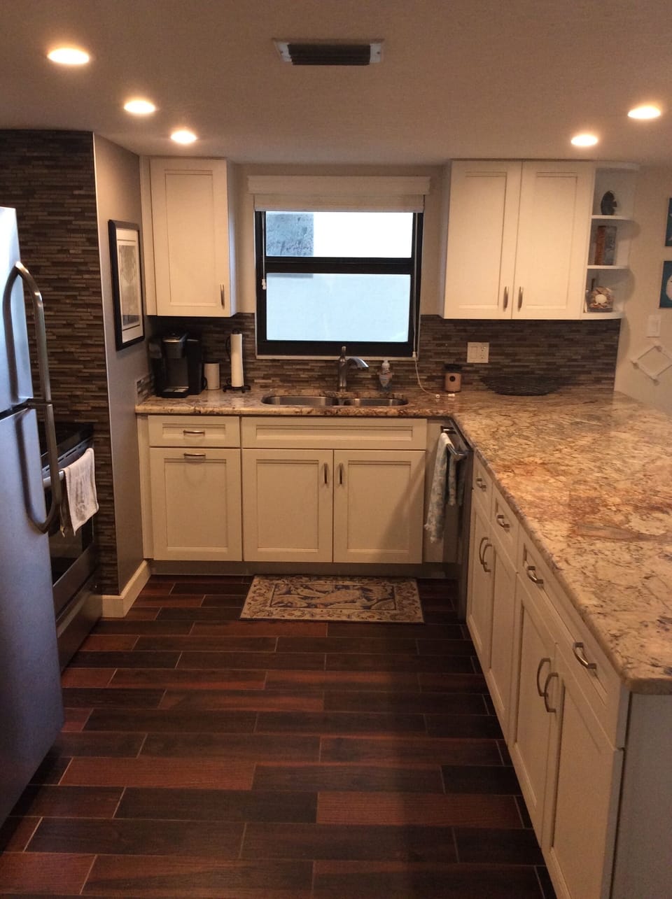 Kitchen with granite counter tops and stainless steel appliances