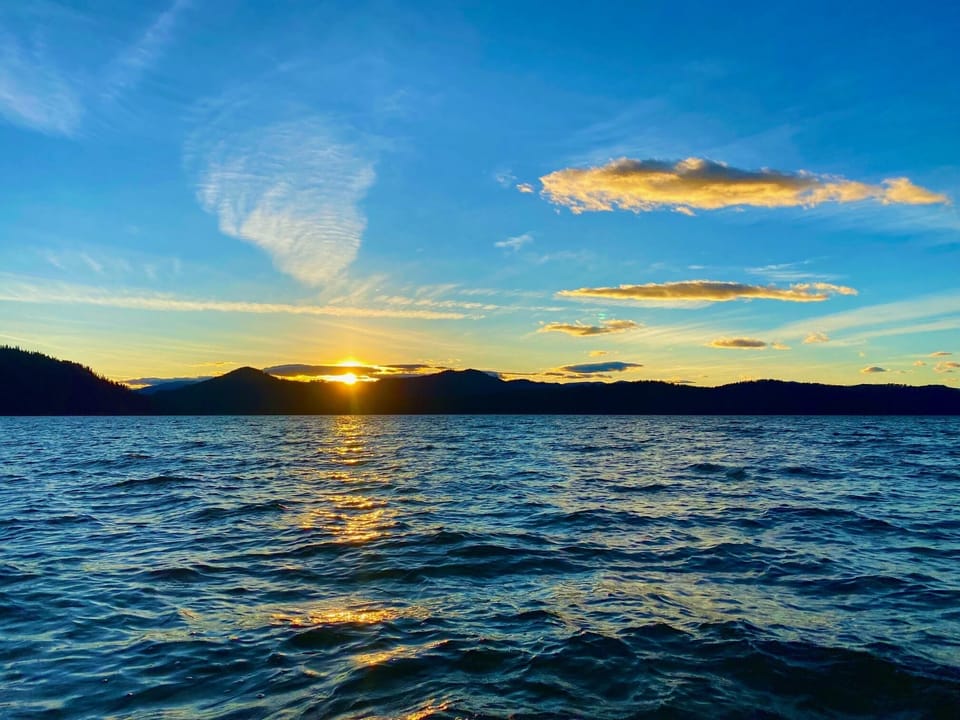 Sunset from your dock chairs.
