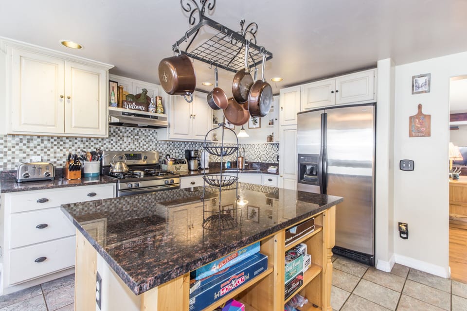 Fully-equipped kitchen with a standard drip coffee pot.