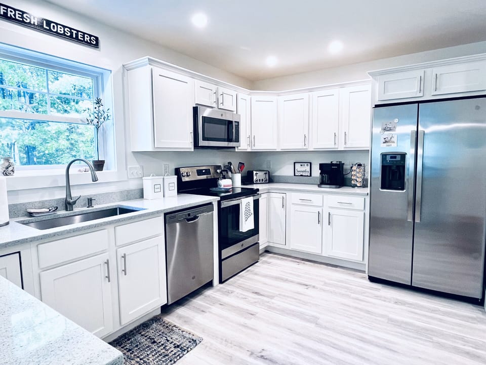 Fully functional kitchen with all amenities provided. 