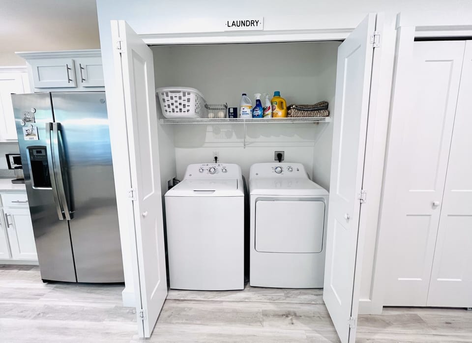Washer and dryer in entry way. 