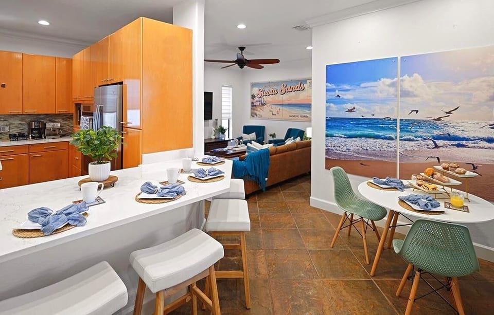 The bistro and kitchen area with a view to the Rec Room/Den