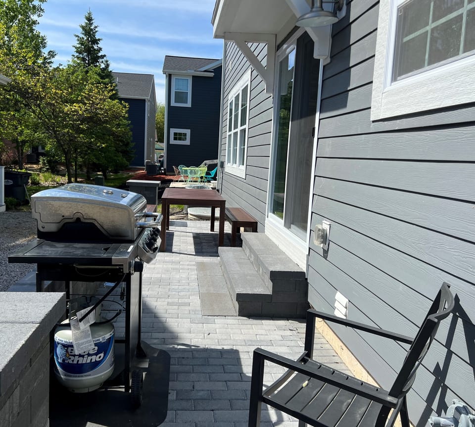 Grilling patio with outdoor dining.