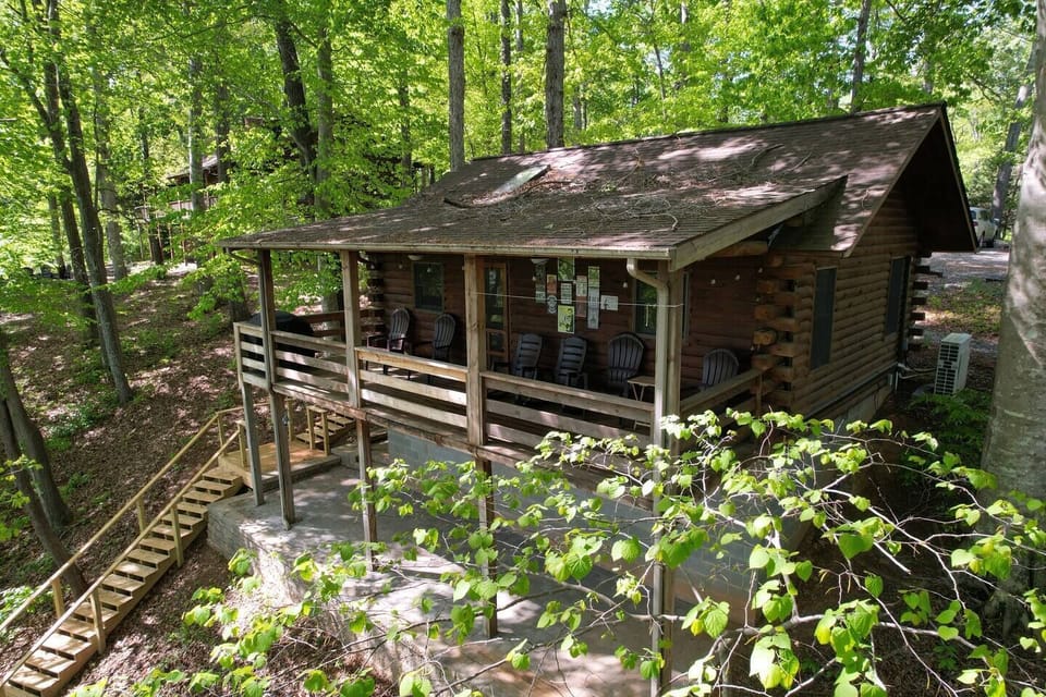 The Cabin at Pine Haven is lake front and has an amazing porch to enjoy your morning coffee as the sun rises over Smith Mountain Lake.