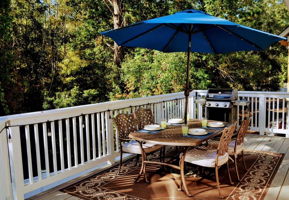Large private deck includes Weber grill and view of quiet nature preserve