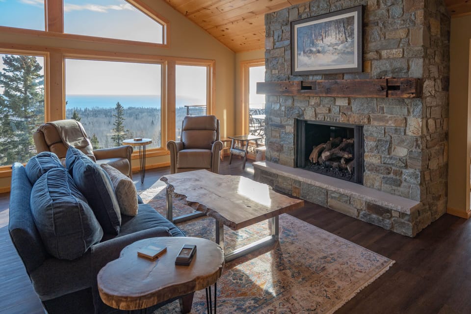 Main Floor Living Room with fully swivel recliners and a kids game table