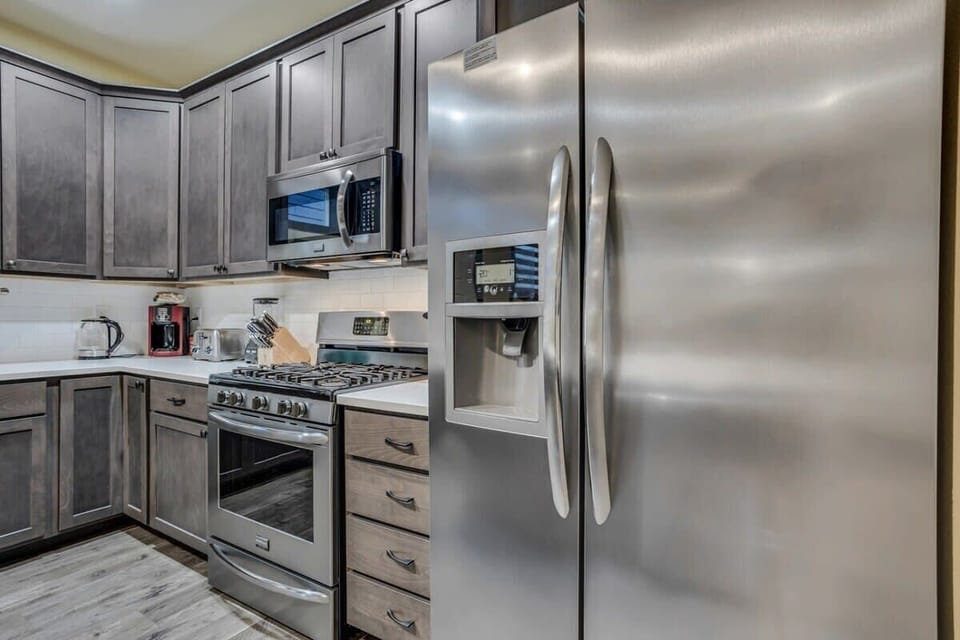 Your fully equipped kitchen features stainless steel appliances and plenty of counter space for preparing memorable meals together.