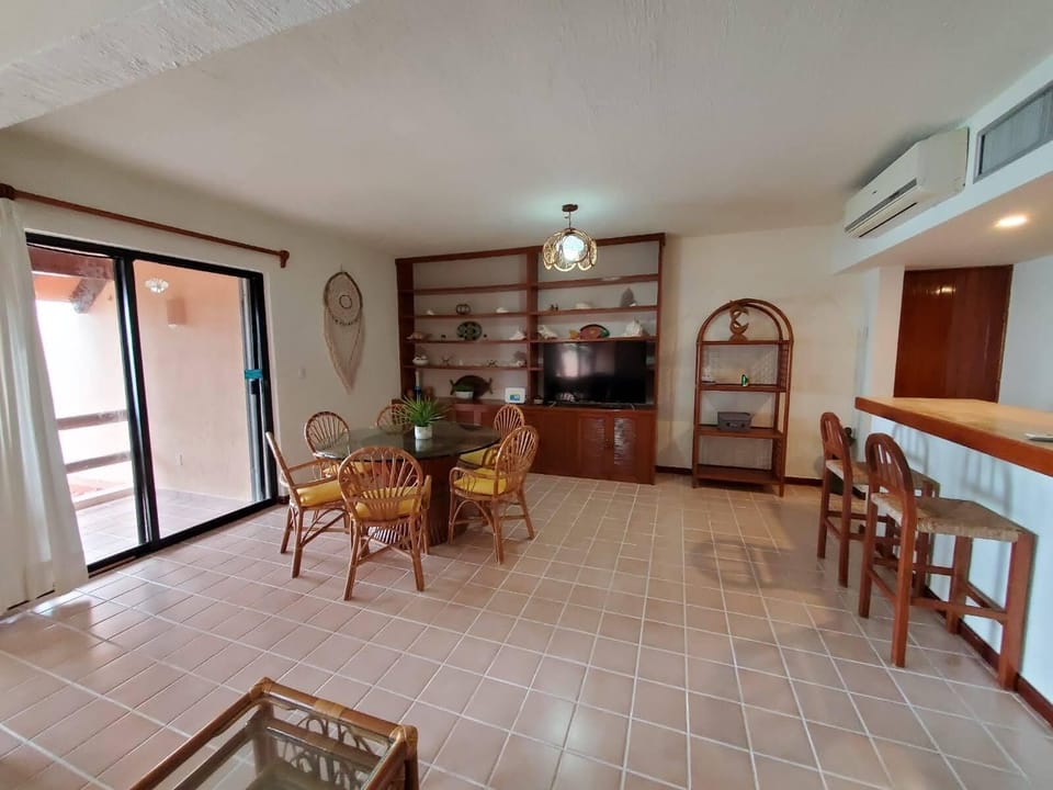 Living / Dining area including flat screen tv