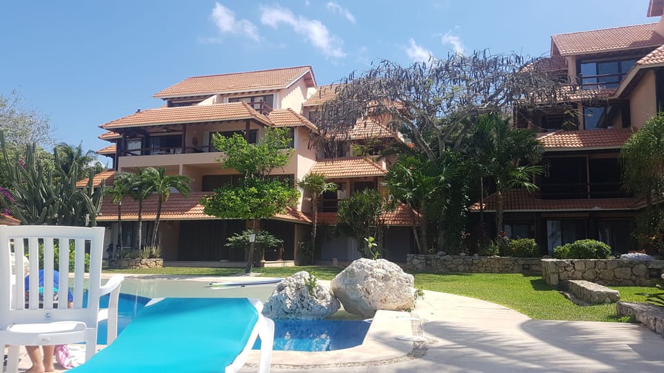 view towards condo unit from pool