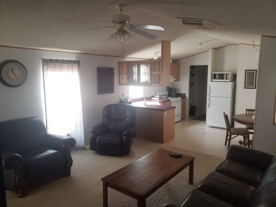 Cozy living room and kitchen with a pantry 