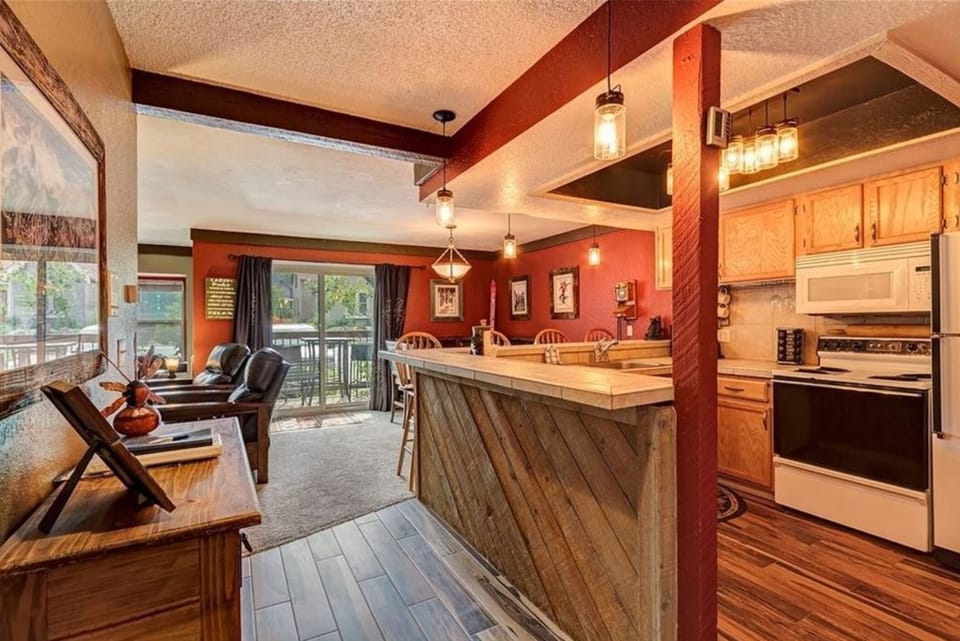 Kitchen and view to east-facing patio