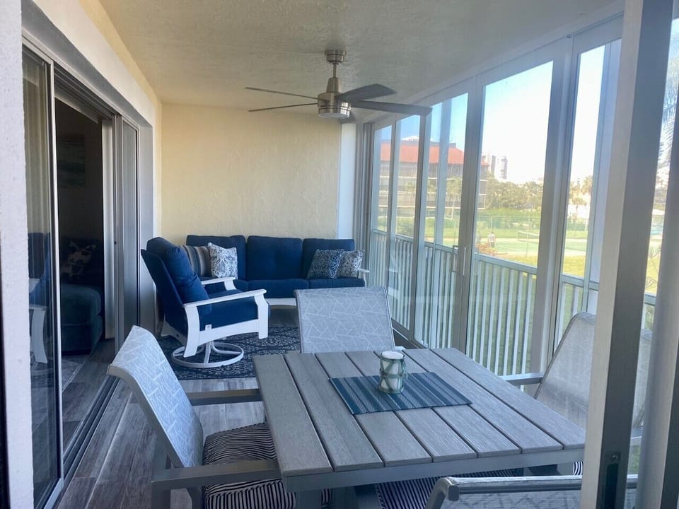 Lanai overlooking the pool with hurricane sliding doors.