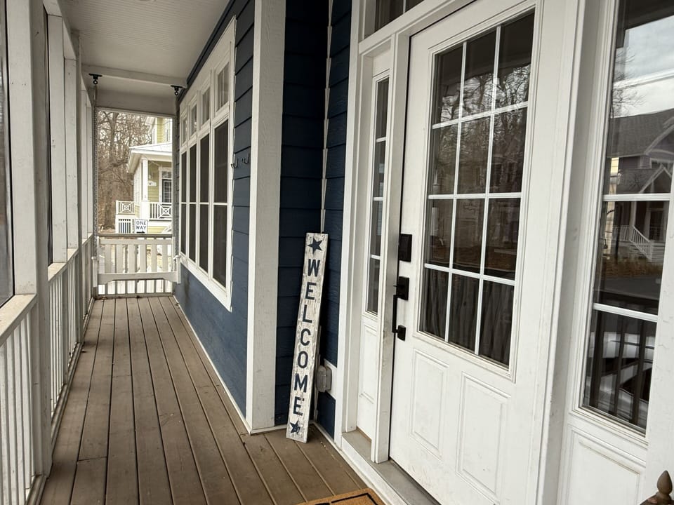 Covered and Screened Porch with Swing