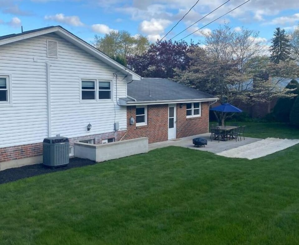 Large, private back yard for playing coin toss, corn hole, soccer, frisbee, etc