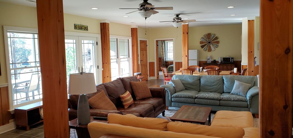 Lower level gathering space, easy in and out to the patio, firepit and lake!