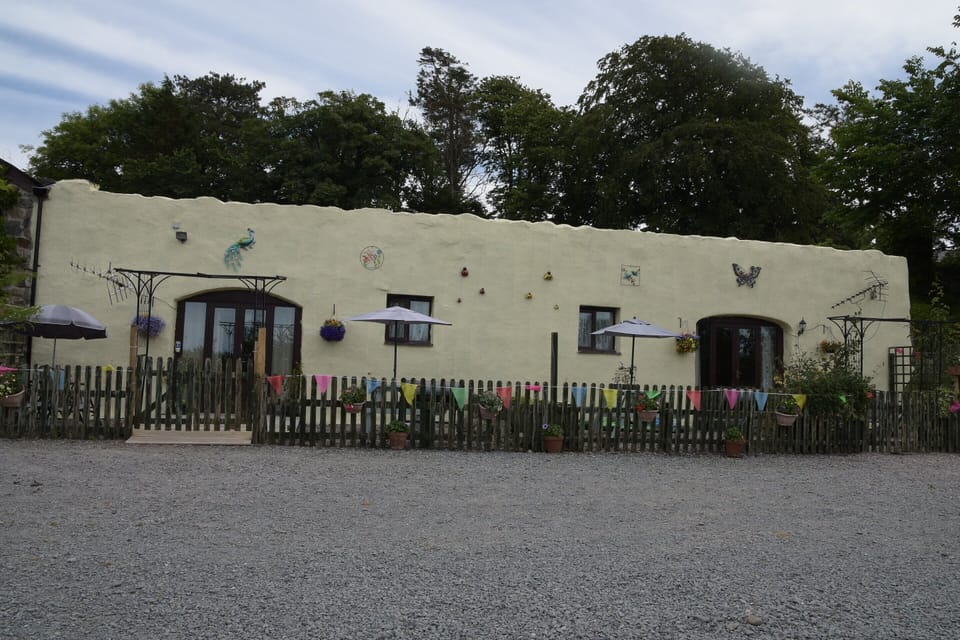 Front of both two bedroom cottages from Car park