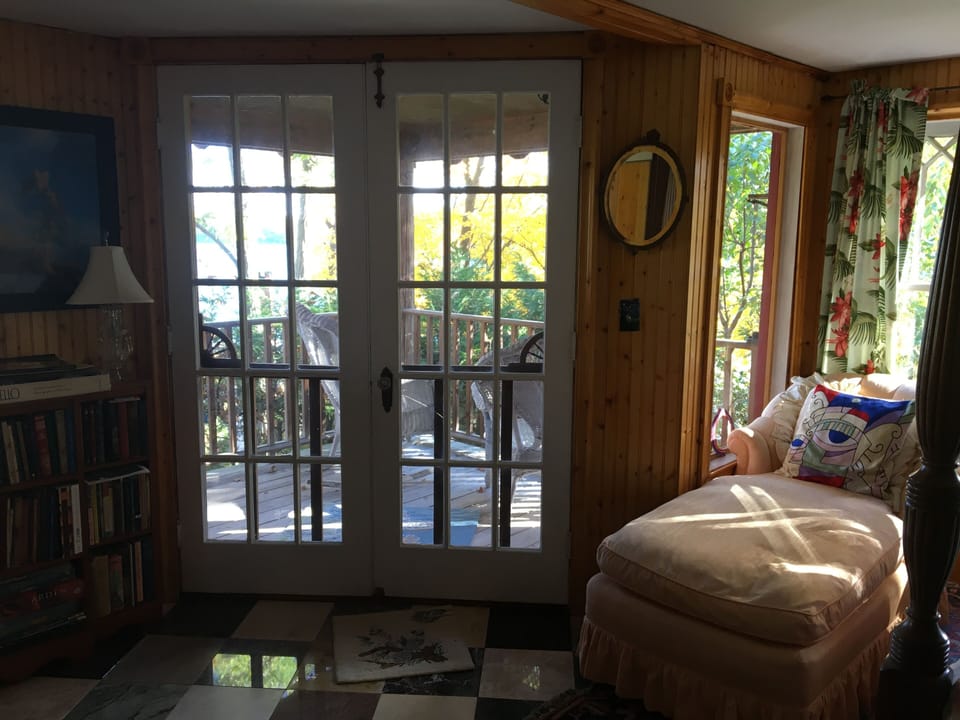 French doors leading to upstairs porch in Master Bedroom