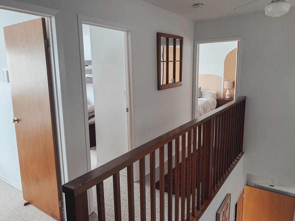 Upstairs hallway: all three bedrooms and one bathroom are on the second level